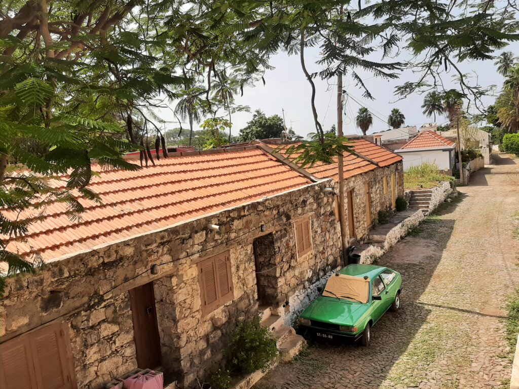 Colourful colonial‑era houses lining Rua Banana in Cidade Velha, Cape Verde — historic UNESCO street on the Cidade Velha & Plateau Heritage Tour