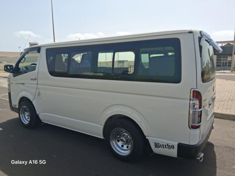 Car or minibus transporting tourists on full-day Fogo Island excursions